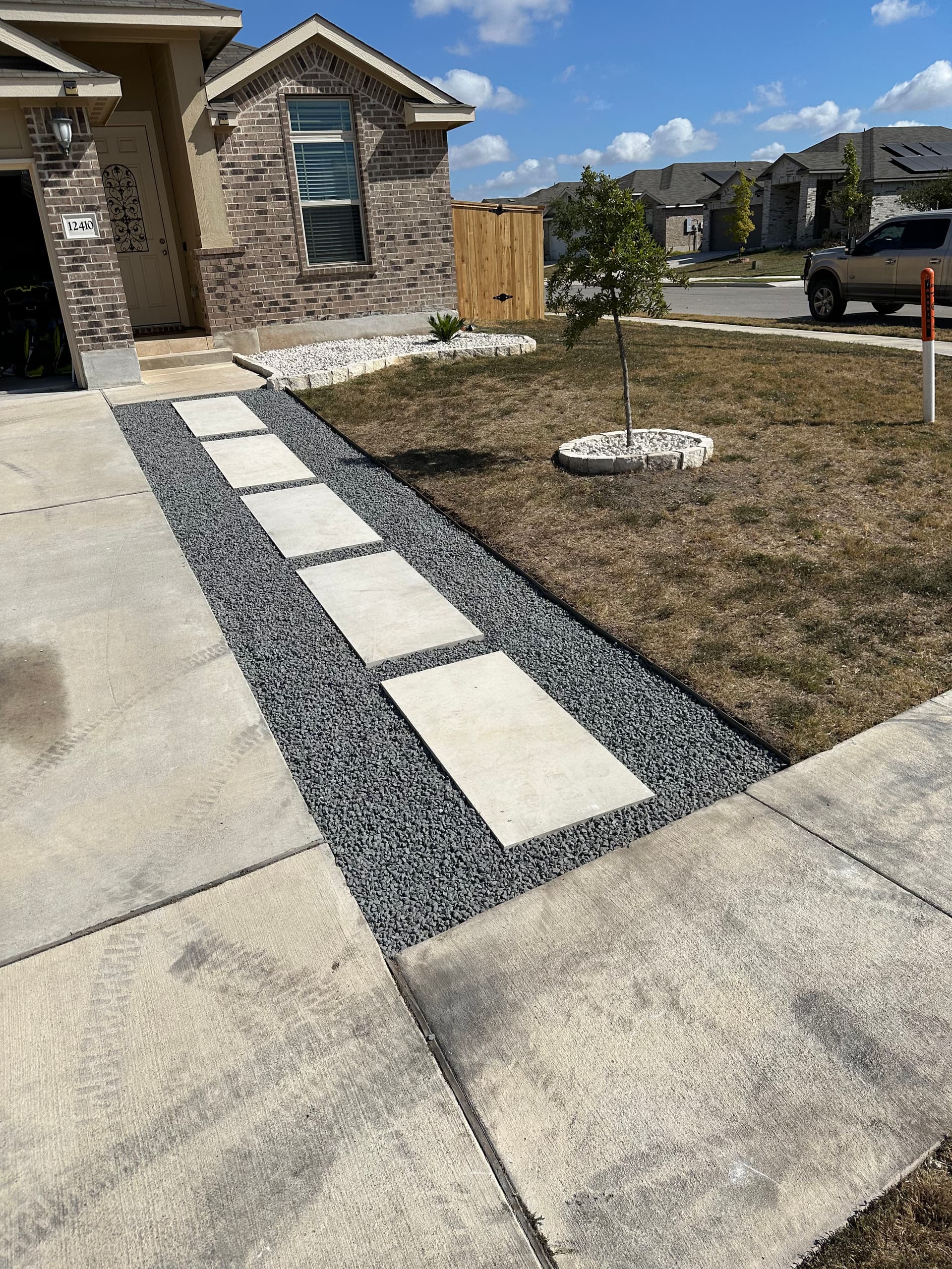 Gallery photos for Limestone Paver Walkway with Black Star Gravel and Xeriscape Beds: Image #1