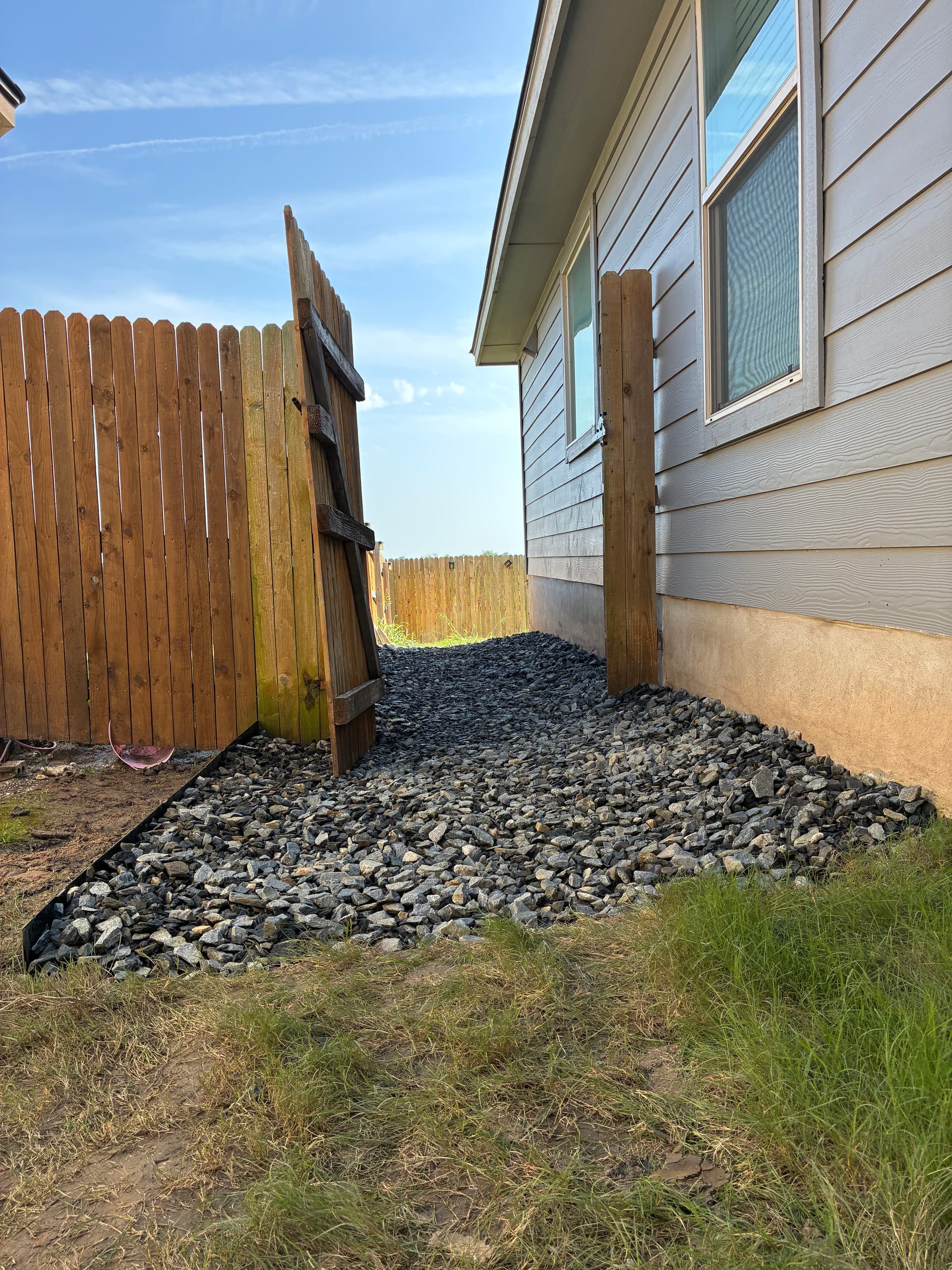 Dry Creek Bed Fix for Eroded Side Yard Drainage image