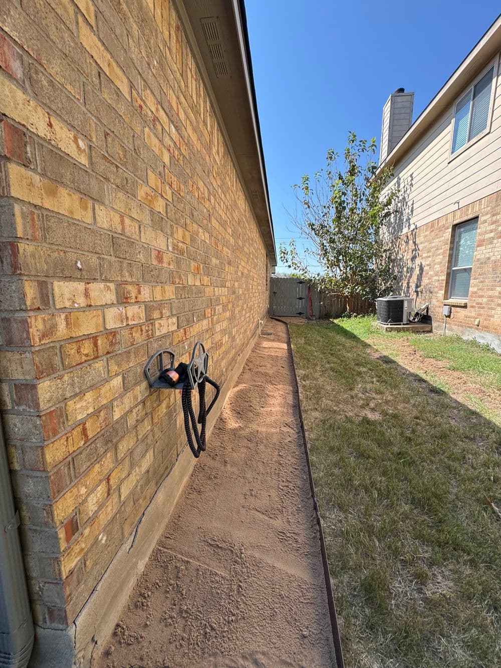 Strengthened Foundation with Robust Rock Bed and Sand Packing in Hutto, TX