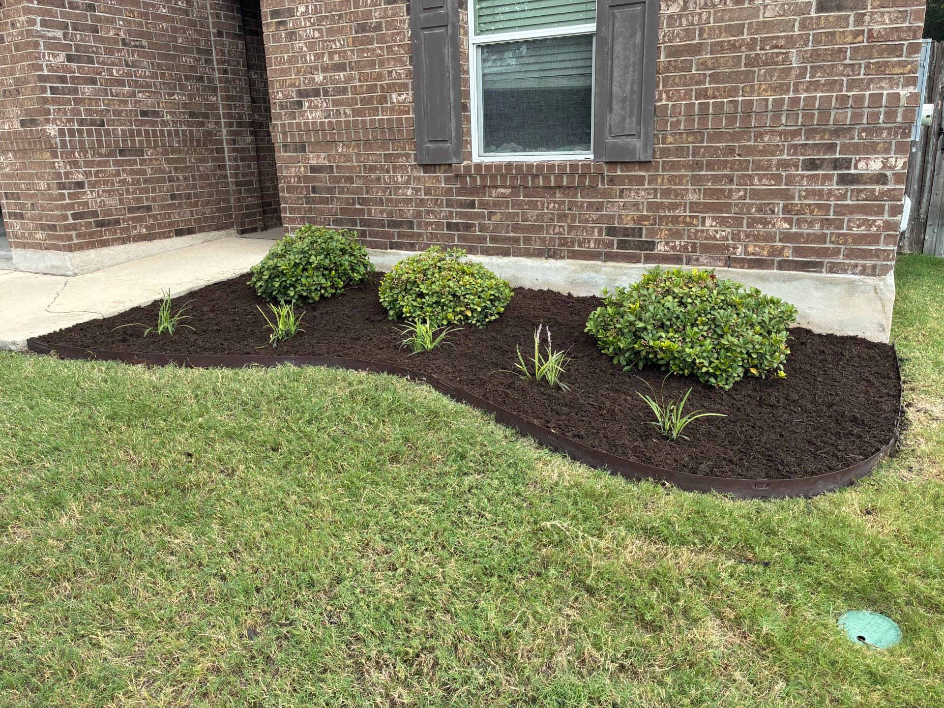 Gallery photos for Fresh Mulch, Clean Edges, and Rock Work That Actually Cuts Upkeep: Image #1